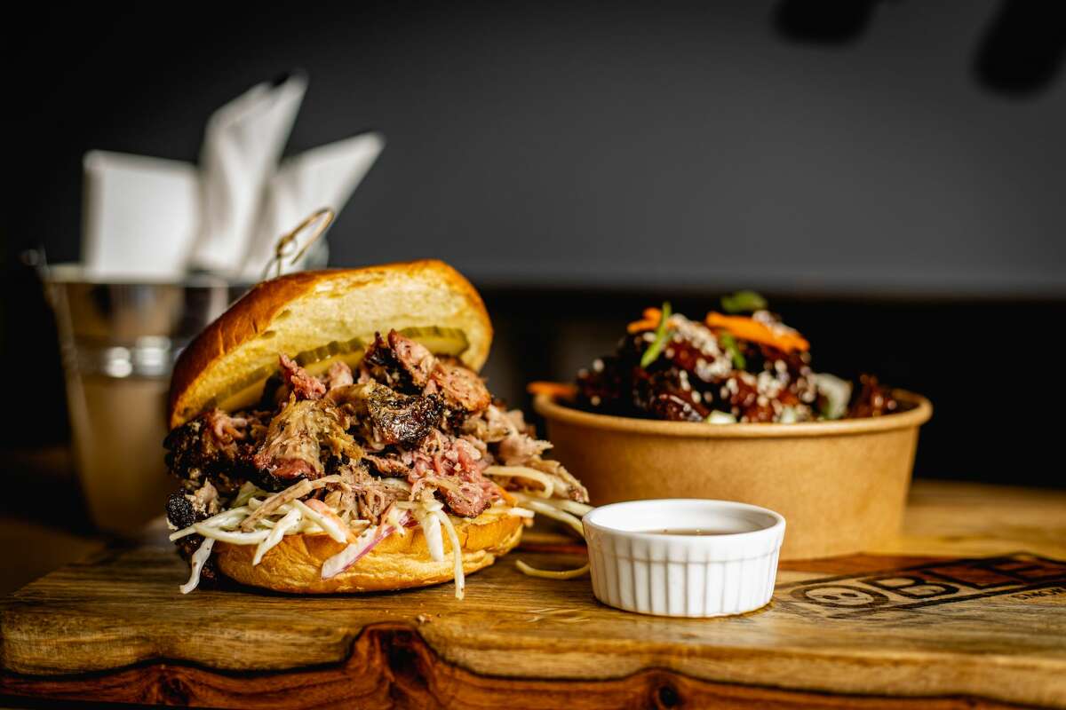 Memphis style pulled pork sandwich from Noble Smokehouse in Mystic on Dec. 28, 2021. Ingredients: Shredded bone-in pork shoulder, house slaw, pickles, brioche bun. Noble Smokehouse, Mystic  New London County Woods Pit, Bantam Litchfield County