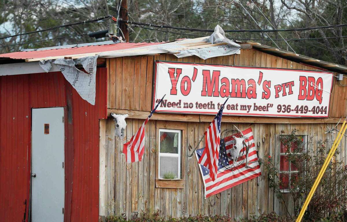 The roof of Yo’ Momma’s Pit BBQ was damaged after a tornado ripped through Montgomery early Sunday morning inflicting significant damage on several local business in downtown Montgomery. The National Weather Service confirmed at least five tornadoes touchdown down in the region.