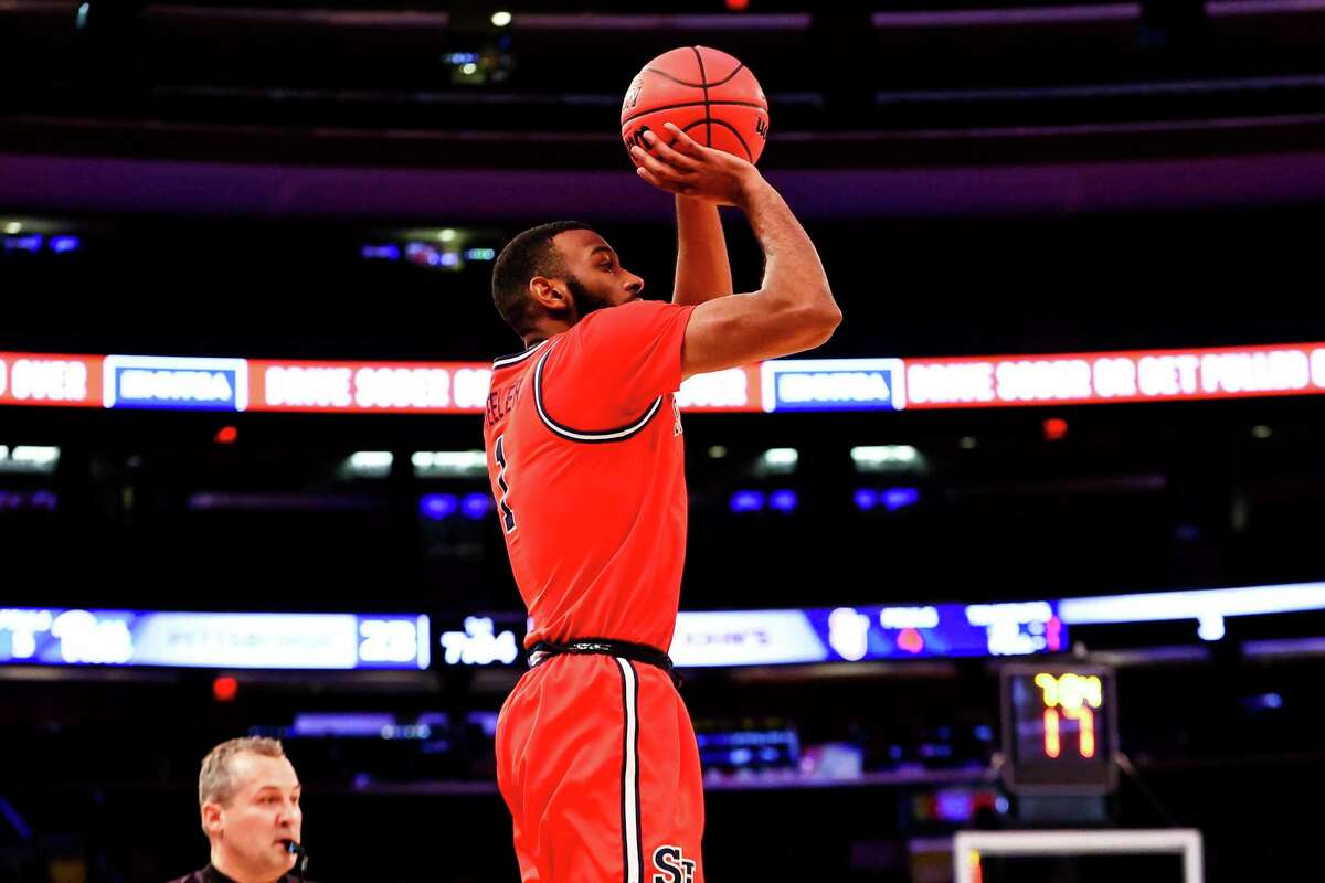 St. John's forward Aaron Wheeler (1) shoots against Pittsburgh during the first half of an NCAA Men's basketball game, Saturday, Dec. 18, 2021, in New York. (AP Photo/Jessie Alcheh)