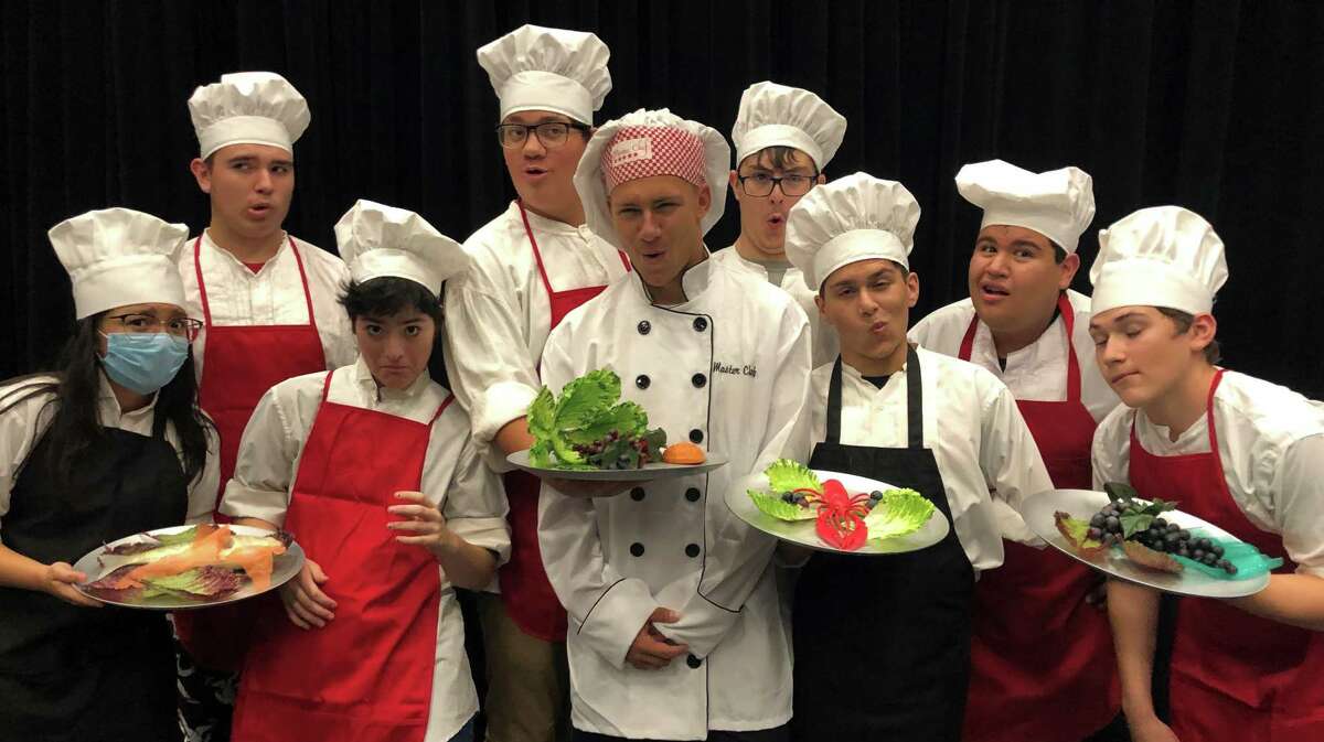 These Alvin High School actors in the school's production of “The Little Mermaid” portray bumbling chefs who try to cook Sebastian the Crab. Shown are Robin Soto, left, Tristyn Chase, Lou Lulek, Andrew Martin, Manny Hernandez, Devin Gourley, Carson Morgan, Federico Gonzalez and Noah White.