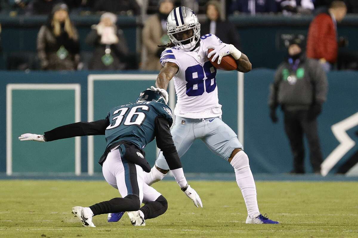 FILE—CeeDee Lamb of the Dallas Cowboys avoids a tackle from Tay Gowan of the Philadelphia Eagles at Lincoln Financial Field on January 08, 2022 in Philadelphia, Pennsylvania.