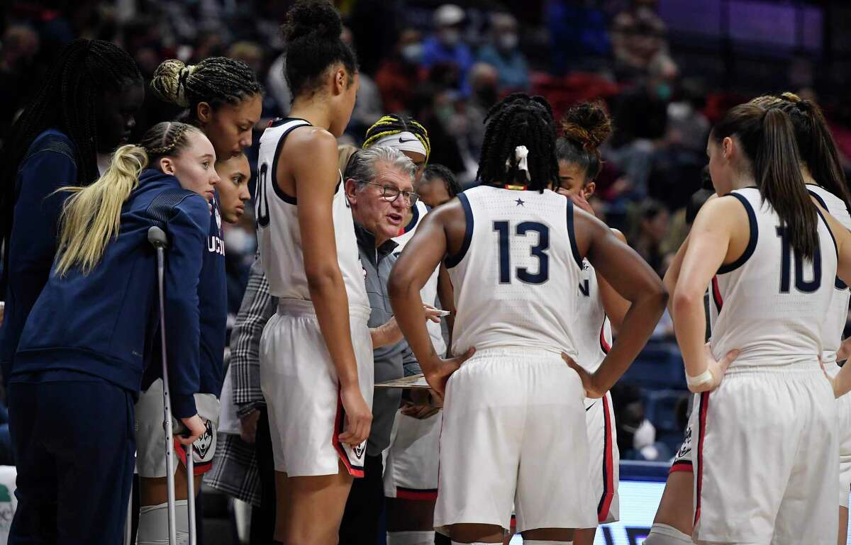 UConn coach Geno Auriemma talks to his team in the second half of an NCAA women’s college basketball game on Sunday, Jan. 9, 2022, in Storrs, Conn.