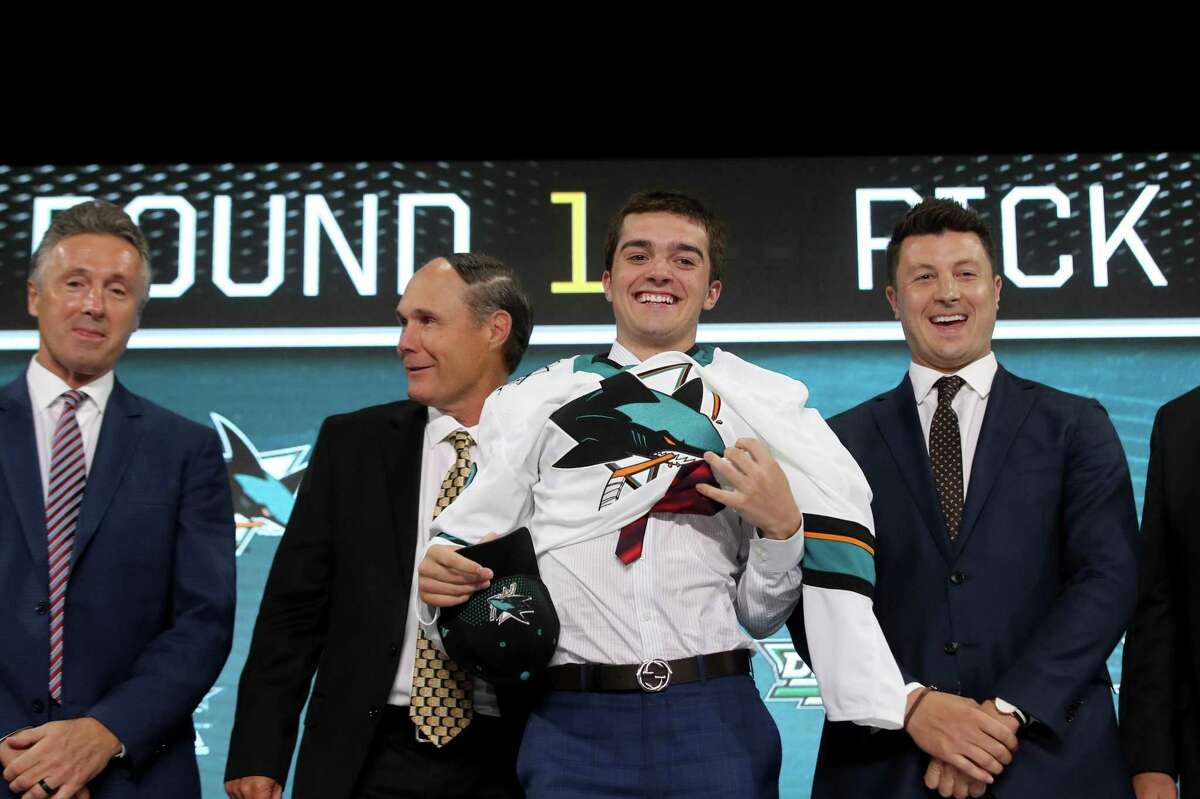 DALLAS, TX - JUNE 22: Ryan Merkley poses after being selected twenty-first overall by the San Jose Sharks during the first round of the 2018 NHL Draft at American Airlines Center on June 22, 2018 in Dallas, Texas. (Photo by Bruce Bennett/Getty Images)