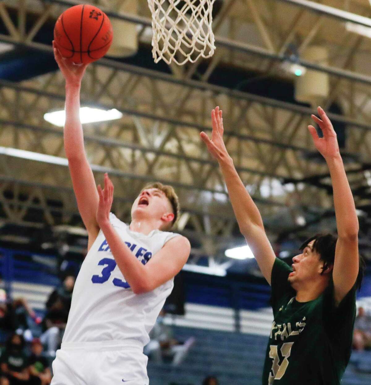 New Caney center Braden Sheldon (33), shown here last month, had 21 points to lead the Eagles over Caney Creek Tuesday night.