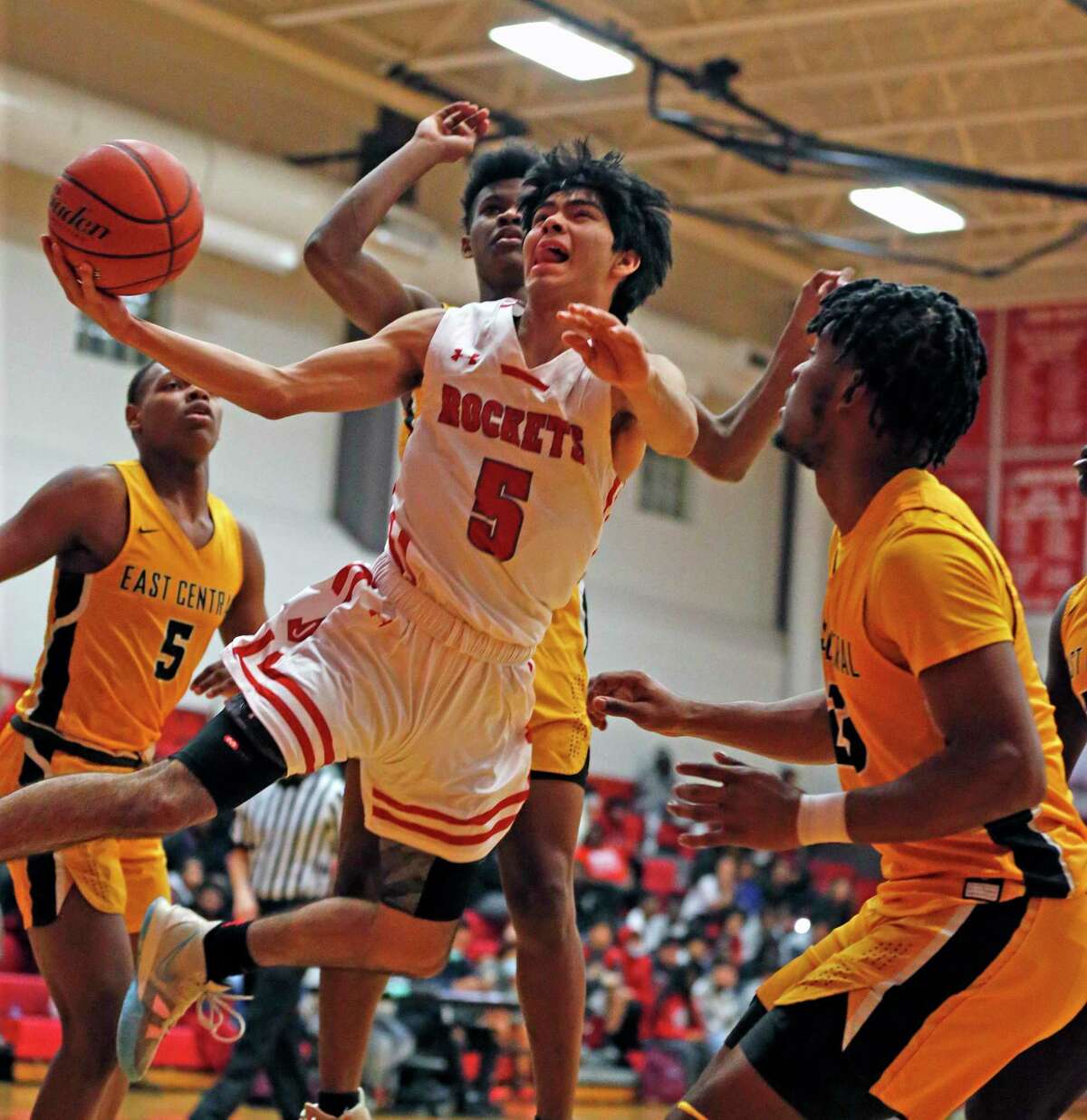 Judson guard Donovan Gomez #5 drives against East Central defenders in first half. East Central defeated Judson 67-65 on Tuesday, Jan. 11, 2022 at Judson HS.
