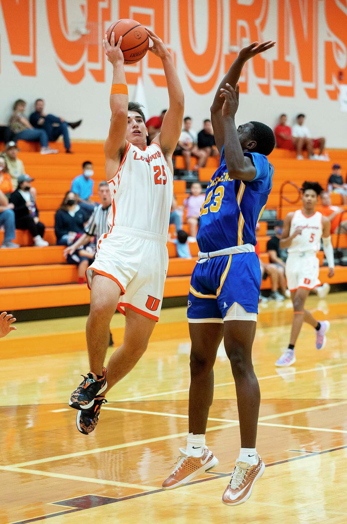 United High School’s Diego Saldaña goes for a layup during a game against Clemens High School, Saturday, Dec. 18, 2021 at United High School.