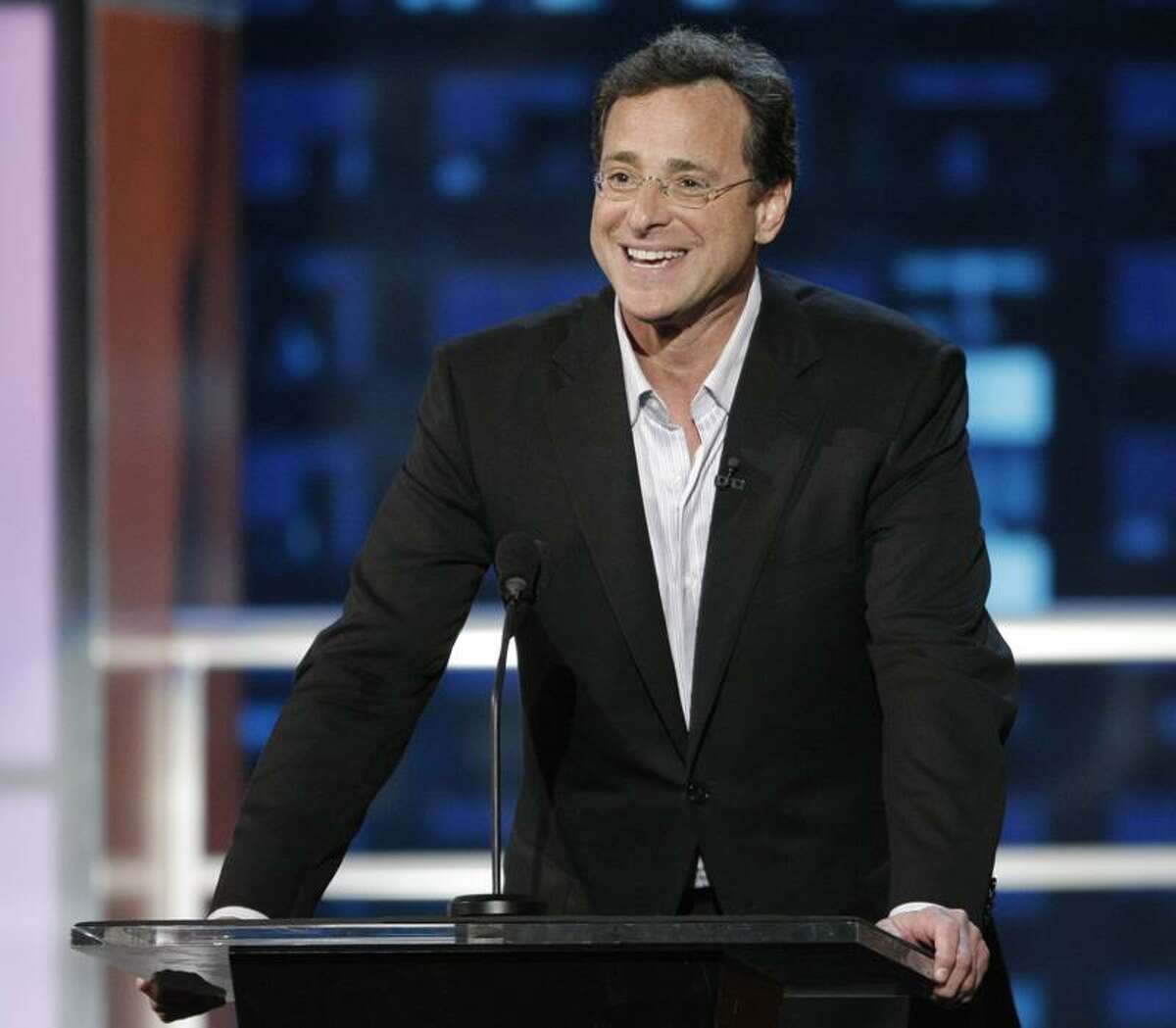 Bob Saget, a comedian and actor known for his role as a widower raising a trio of daughters in the sitcom "Full House," died in Florida on Sunday, Jan. 9, 2022. He was 65 (Pictured: Aug. 3, 2008.)