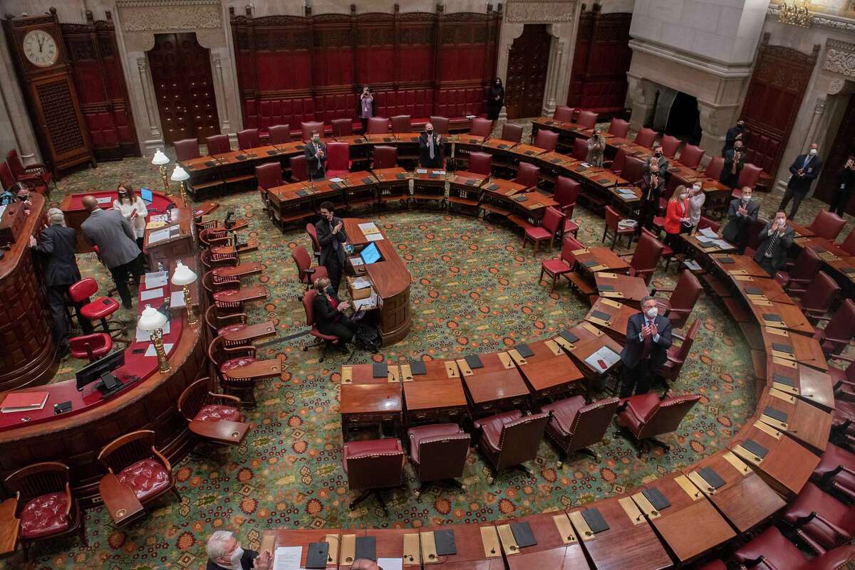 Senators applaud after Shirley Troutman’s confirmation vote for Court of Appeals in the Senate Chamber at the New York State Capitol on Wednesday, Jan. 12, 2022 in Albany, N.Y.