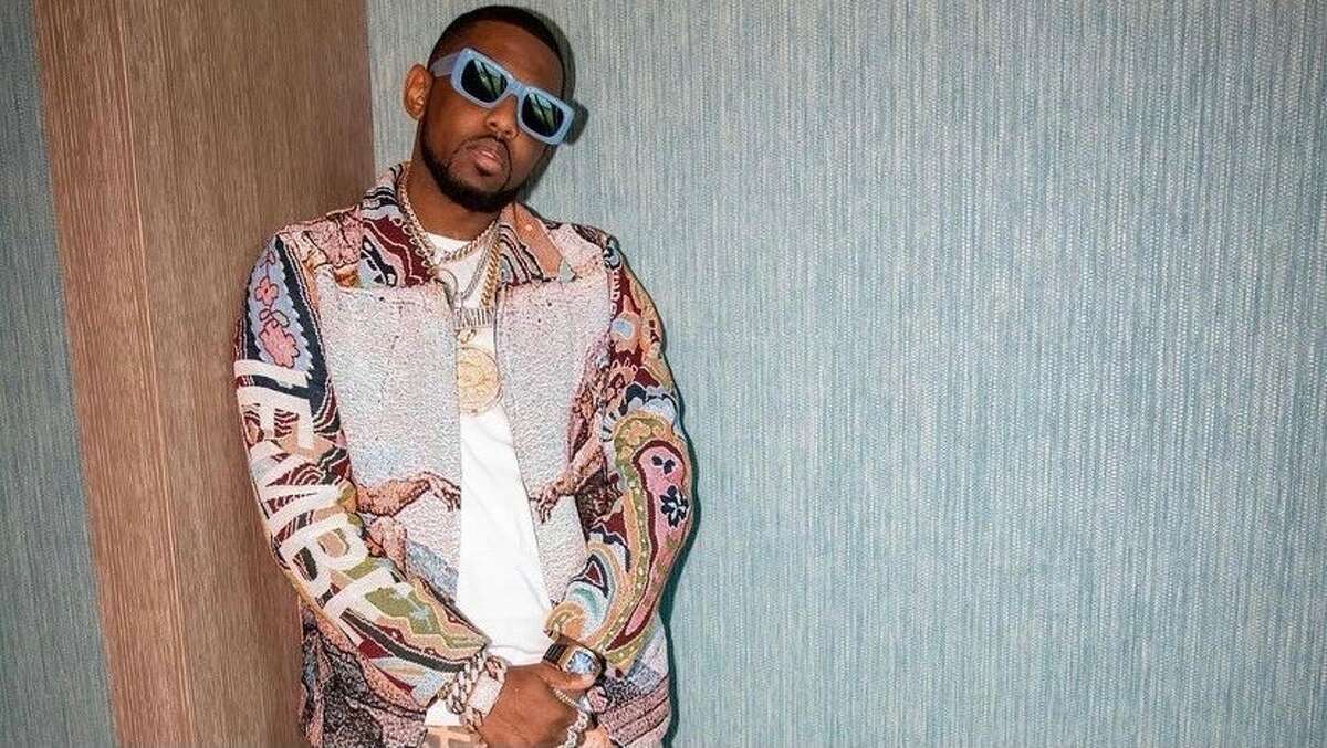 Rapper Fabulous posing in front of the camera wearing the "Biblical IEMBE Jacket."