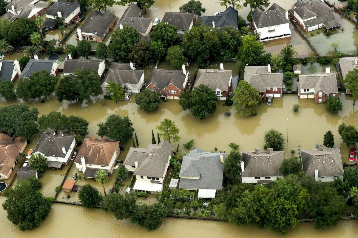 Floodwaters from the Addicks Reservoir inundate a neighborhood off N. Eldridge Parkway in the aftermath of Tropical Storm Harvey on Wednesday, Aug. 30, 2017, in Houston. ( Brett Coomer / Houston Chronicle )