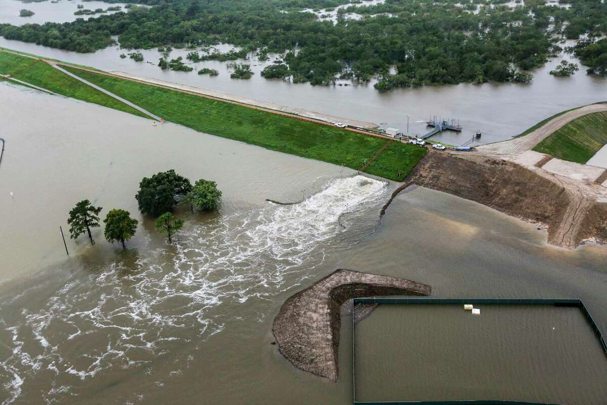 Water is released from the Barker Reservoir in the aftermath of Tropical Storm Harvey on Tuesday, Aug. 29, 2017, in Houston. ( Brett Coomer / Houston Chronicle )