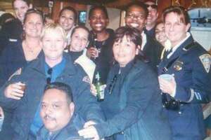 New Haven police Officer Diane Gonzalez, second from right, front,  died Jan. 10, 2022, after slipping into a coma in 2008 after an on-duty crash.
