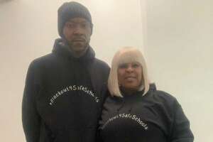 Rayvon and Ranese Cox at Waltersville and Skane School, respectively, in Bridgeport wore #Blackout4SafeSchools sweatshirts on Wednesday.