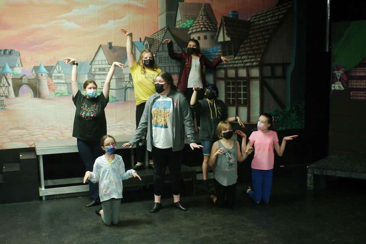 Young actors with Friendswood’s Purple Box Theater rehearse a scene from “Shrek the Musical Jr.,” which they will perform Jan. 14-16.
