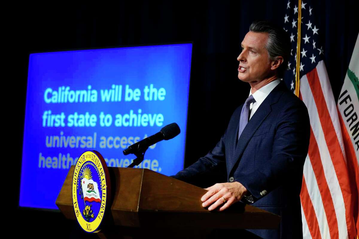 California Gov. Gavin Newsom unveils his proposed $286 billion 2022-2023 state budget during a Monday news conference in Sacramento. The governor wants to make California the first state to cover all low-income residents under its Medicaid plan regardless of their immigration status.