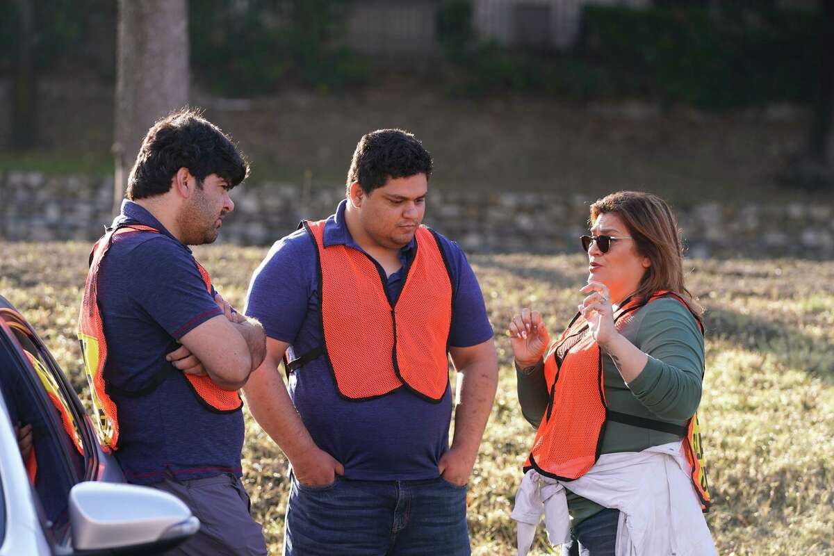 Riaz Sardar Khil, left, who is the father of missing 3-year-old Lina Sardar Khil, talks with Lawang Mangal and Eagles Flight Advocacy CEO Pamela Allen during a Jan. 9 search for the girl. A more recent search occured this week in Fredericksburg after police received a tip that Lina was buried in that Hill Country town. Lina — who disappeared Dec. 20, 2021, from a playground at the apartment complex where her family lives — remains unfound.