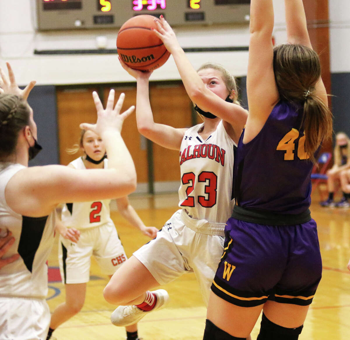 Calhoun's Jaelyn Hill (middle) shoots over a Williamsville defender in a Dec. 27 game at the Carlinville Tournament. On Wednesday, Hill scored a game-high 16 points in a win over South County at the North Greene Tourney in White Hall.
