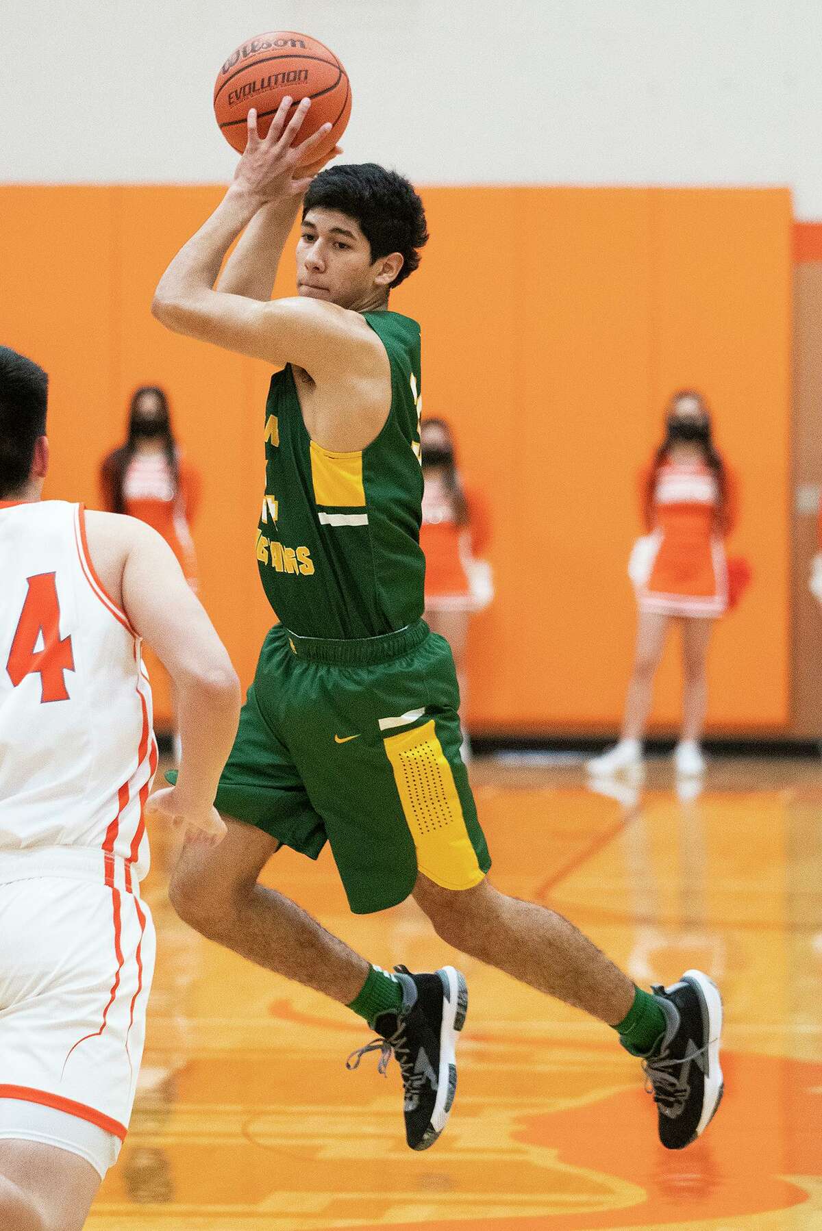 Ian Tovar receives a pass during a game against United High School Tuesday, Jan. 11, 2022.
