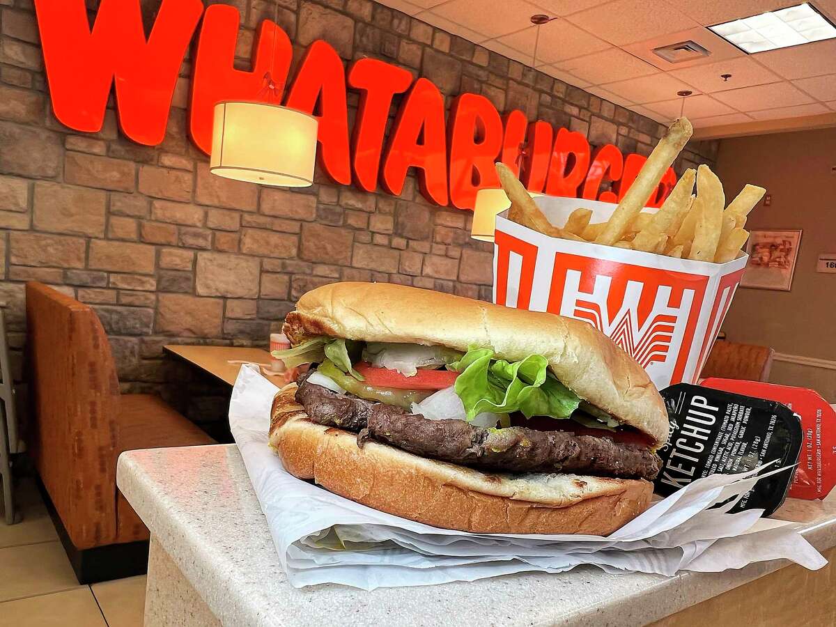 The classic single-patty Whataburger comes with mustard, lettuce, pickles, tomatoes and onions.