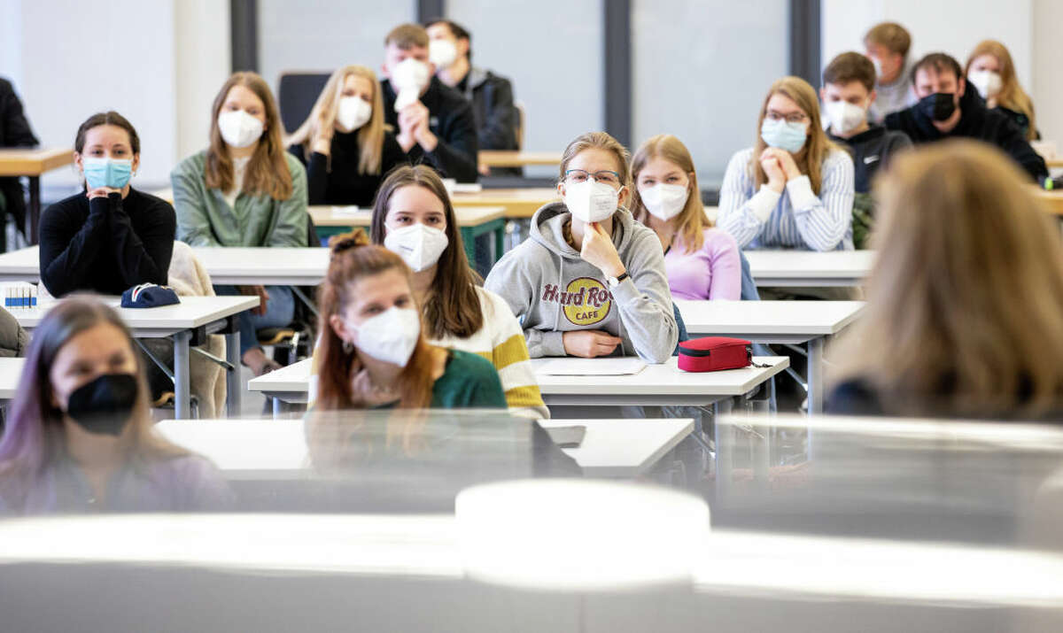 Students in class at a higher education institution in the Hanover region of Germany. (Photo by Moritz Frankenberg/picture alliance via Getty Images)