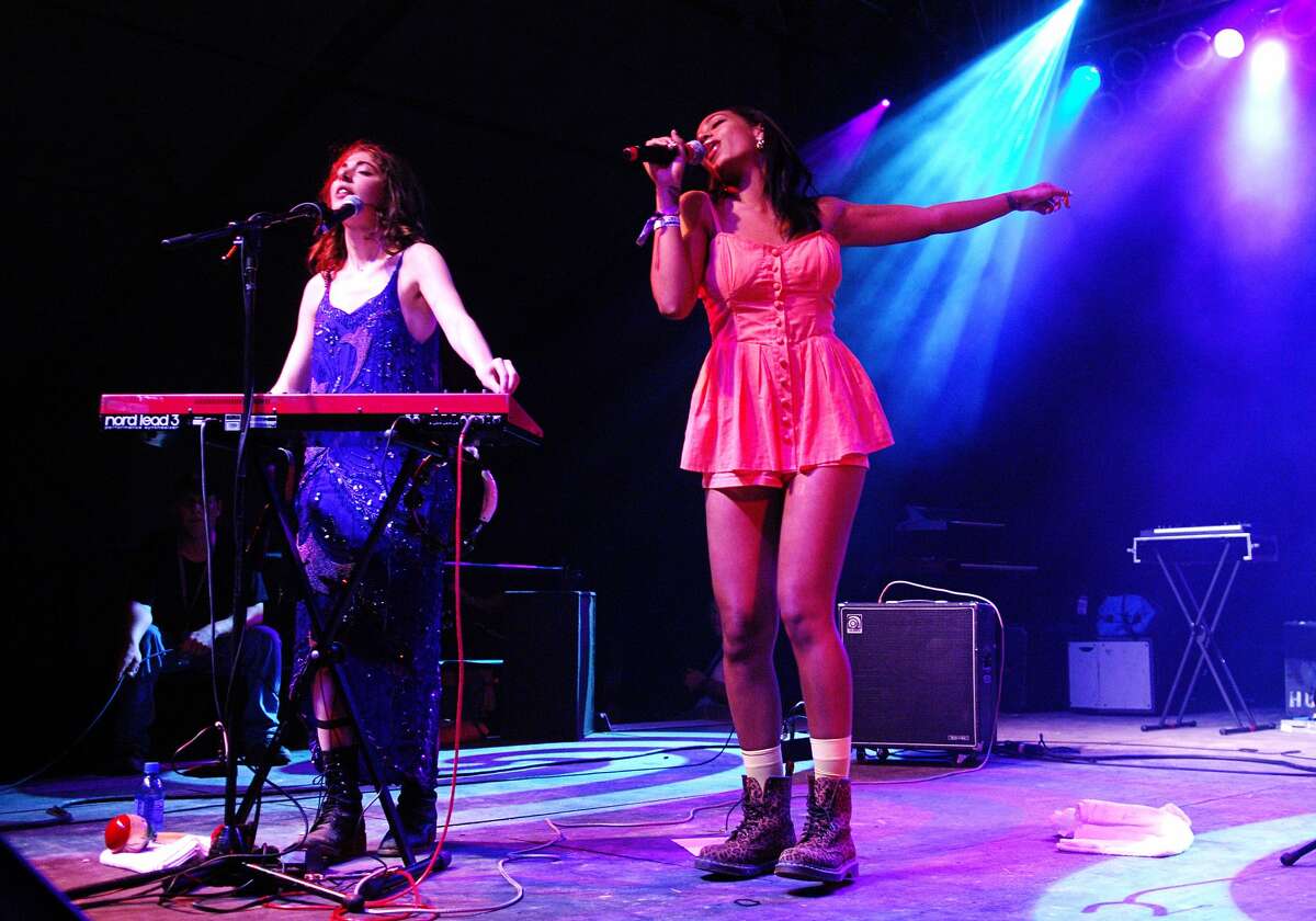 Caroline Polachek of Chairlift and Solange Knowles performs during the 2009 Bonnaroo Music and Arts Festival on June 11, 2009 in Manchester, Tennessee. 