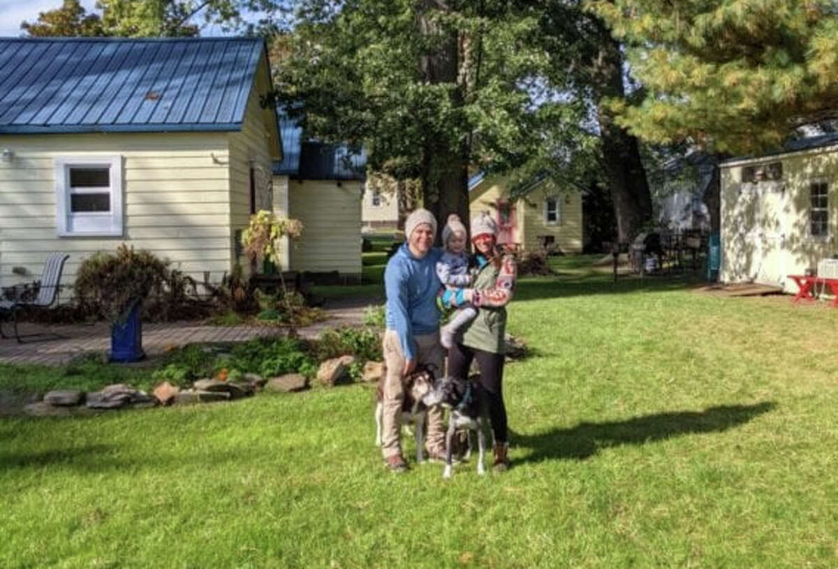 Daniel and Kimberly Guest with their daughter Lottie before they purchased the six Little Yellow Cottages this past November. The Guests plan on having the cottages be open for rent year-round when they open for 2022 season. 