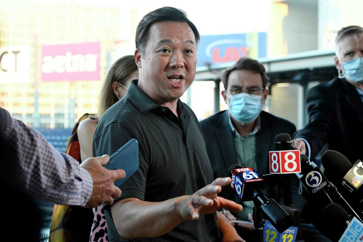 In this Thursday, Aug. 20, 2020, file photo, Connecticut Attorney General William Tong speaks to the media during a watch party for the Democratic National Convention at Dunkin' Donuts Park.