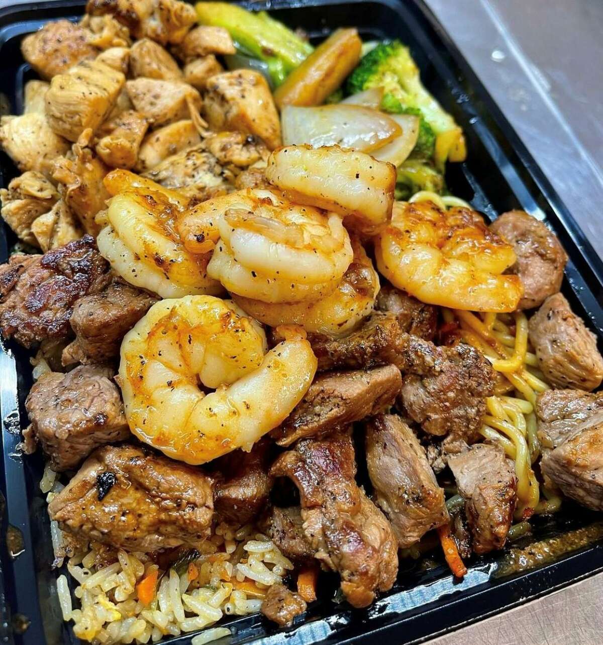 Hibachi Bros. serves up a New York Steak, chicken and shrimp trio for meat lovers.