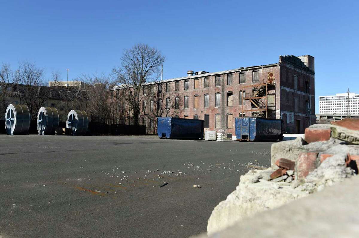 The former Blickensderfer factory lot at 650 Atlantic St. in Stamford, Conn., photographed on Tuesday, Jan. 11, 2022. Connecticut Gov. Ned Lamont approved just under $1,000,000 in funding to abate and preserve the existing buildings and remediate soil and groundwater at the 2.5-acre site, which will be used for a mixed-use, transit-oriented development.