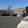 The former Blickensderfer factory lot at 650 Atlantic St. in Stamford, Conn., photographed on Tuesday, Jan. 11, 2022. Connecticut Gov. Ned Lamont approved just under $1,000,000 in funding to abate and preserve the existing buildings and remediate soil and groundwater at the 2.5-acre site, which will be used for a mixed-use, transit-oriented development.