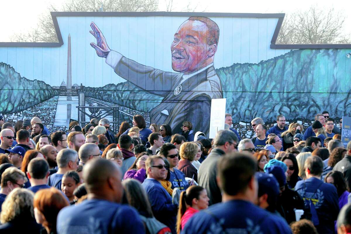 Marchers gather Monday January 15, 2018 before the 50th annual Martin Luther King Day march in San Antonio.