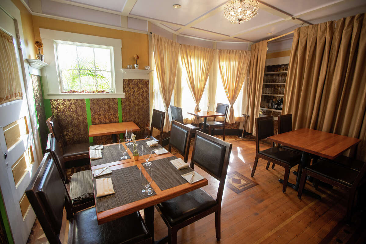 One of the interior dining rooms at All Spice restaurant in San Mateo, Calif. on Jan. 11, 2022. The restaurant is located in a historic 1906 Victorian home.