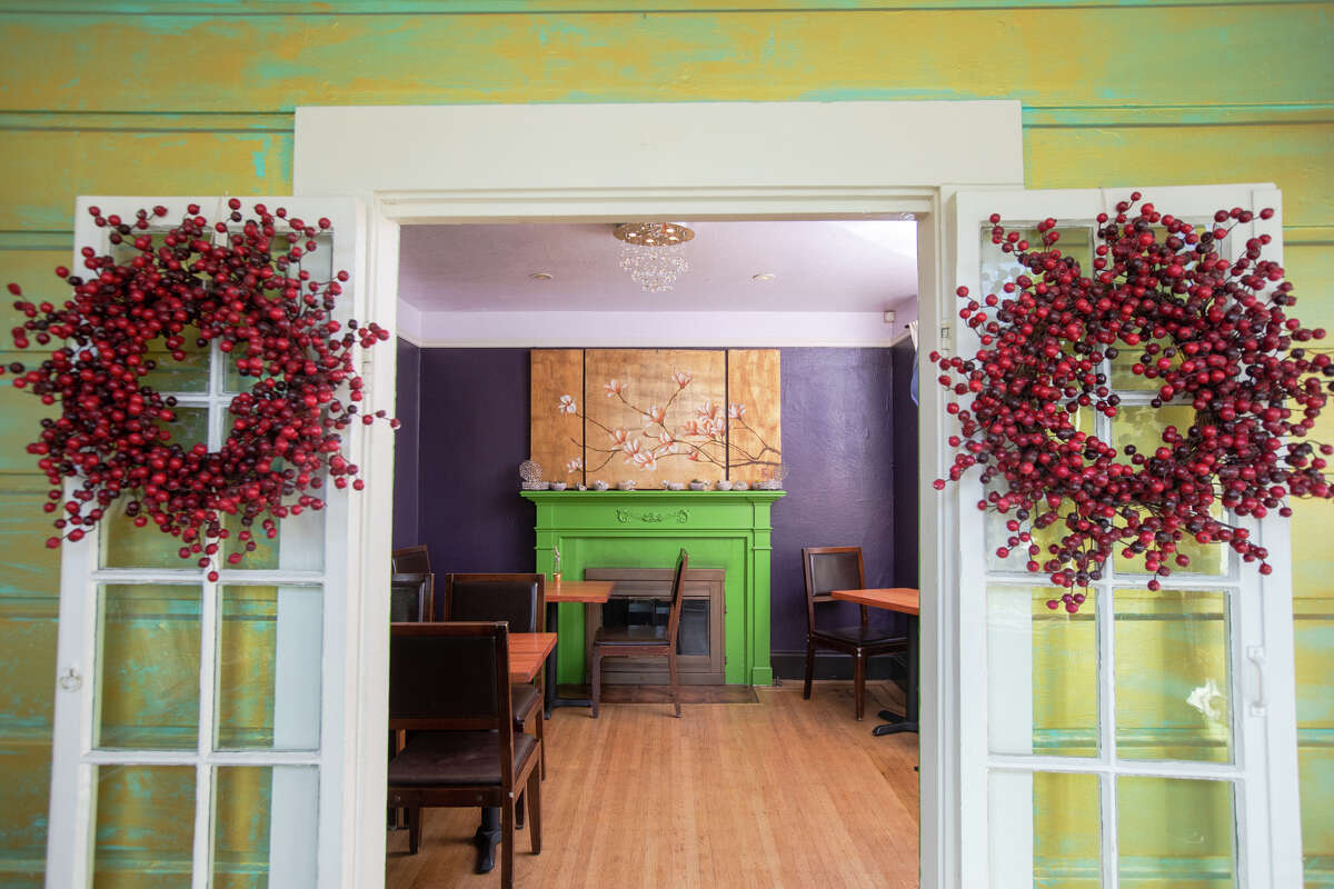 The foyer of the restaurant opens into one of the interior dining rooms at All Spice restaurant in San Mateo, Calif. on Jan. 11, 2022. The restaurant is located in a historic 1906 Victorian home.