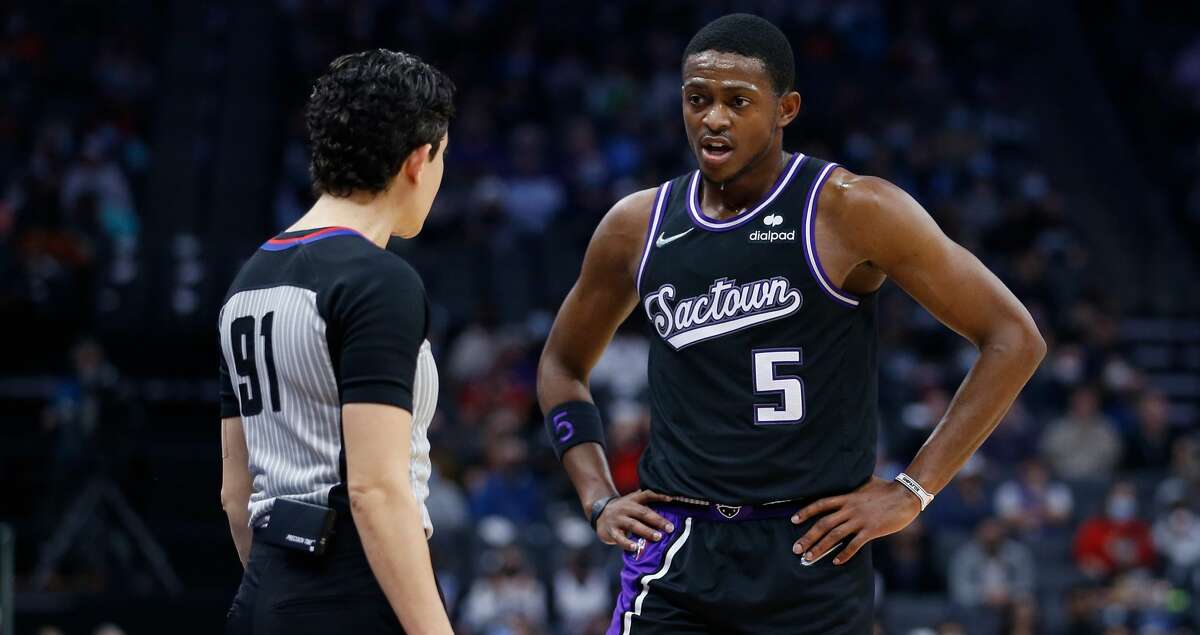 De'Aaron Fox #5 of the Sacramento Kings talks to referee Cheryl Flores #91 during the game against the Memphis Grizzlies at Golden 1 Center on December 26, 2021 in Sacramento, California. (Photo by Lachlan Cunningham/Getty Images)