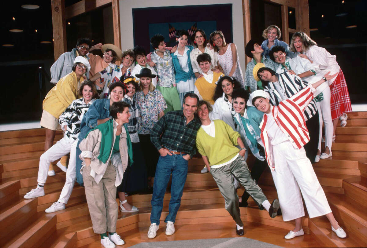 Doug and Susie Tompkins posing with Esprit employees in 1985.