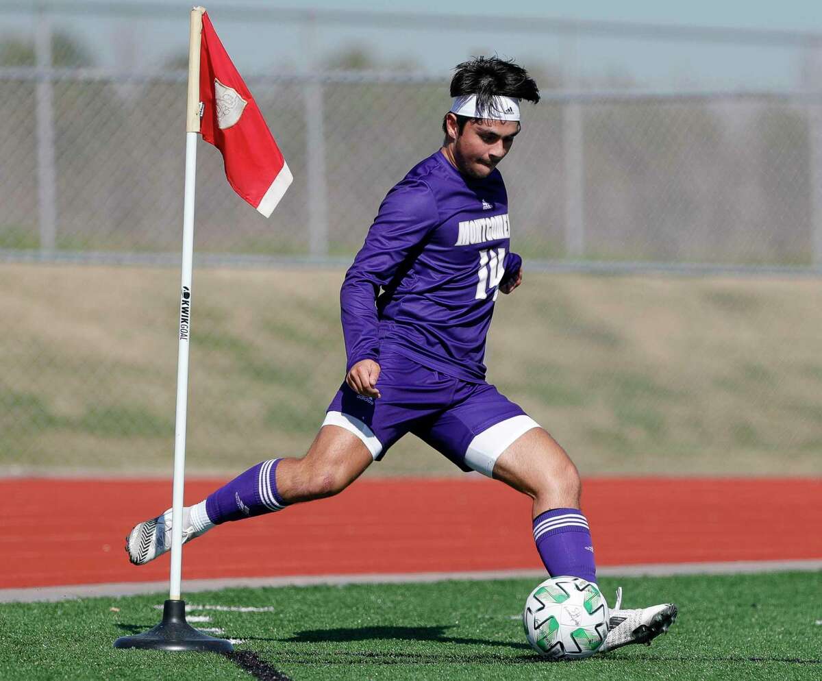 Montgomery’s Delas Salas (14) takes a corner kick in the first period of a high school soccer match at Summer Creek High School, Thursday, Jan. 13, 2022, in Houston.