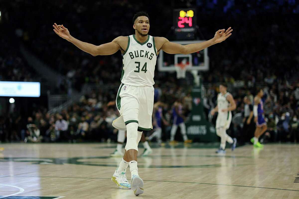 MILWAUKEE, WISCONSIN - JANUARY 13: Giannis Antetokounmpo #34 of the Milwaukee Bucks reacts to a three point shot during the second half of a game against the Golden State Warriors at Fiserv Forum on January 13, 2022 in Milwaukee, Wisconsin. NOTE TO USER: User expressly acknowledges and agrees that, by downloading and or using this photograph, User is consenting to the terms and conditions of the Getty Images License Agreement. (Photo by Stacy Revere/Getty Images)