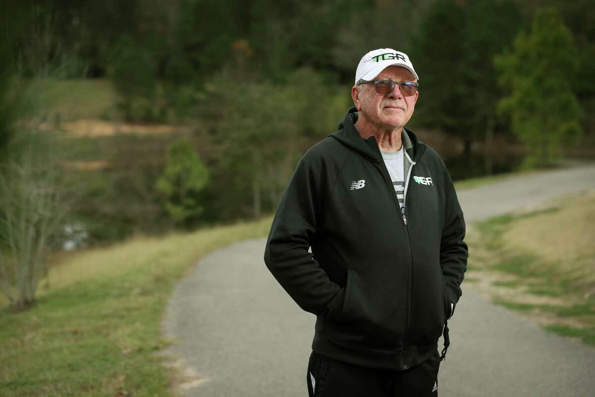 Running coach Dan Green poses for a portrait before a training session Wednesday, Jan. 12, 2022 in The Woodlands. Green, who was the first winner of the Houston Marathon in 1972 and long-time track and cross country coach at McCullough and The Woodlands High School, now coaches runners from all different skill levels through Team Green Running.