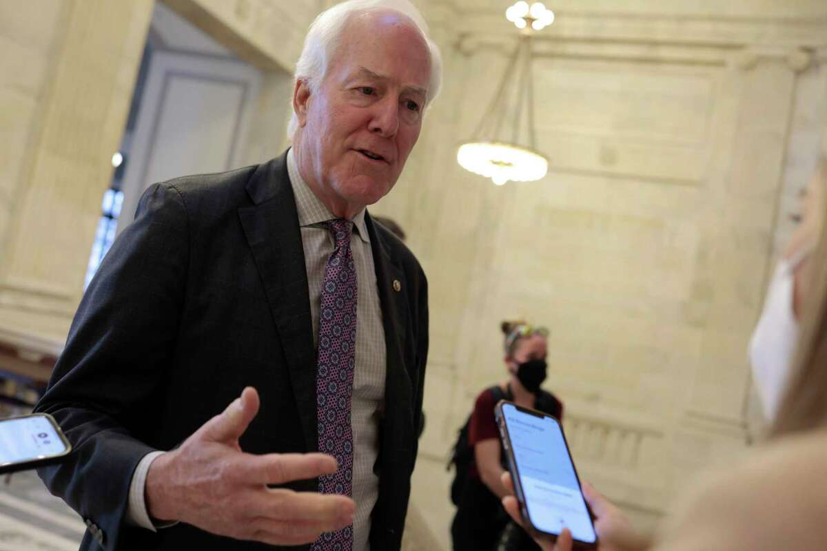Sen. John Cornyn (R-TX) speaks to reporters as he arrives to a Senate Republican Policy Luncheon on Capitol Hill on January 04, 2022 in Washington, DC.