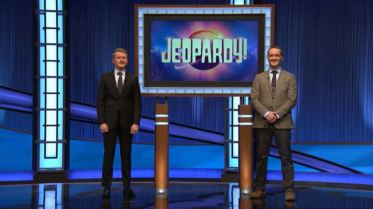 Dr. Andrew Tyler of Friendswood, right, stands with Ken Jennings, host and consulting producer of “Jeopardy!” Tyler's appearance as a contestant on the show was televised on Dec. 23.