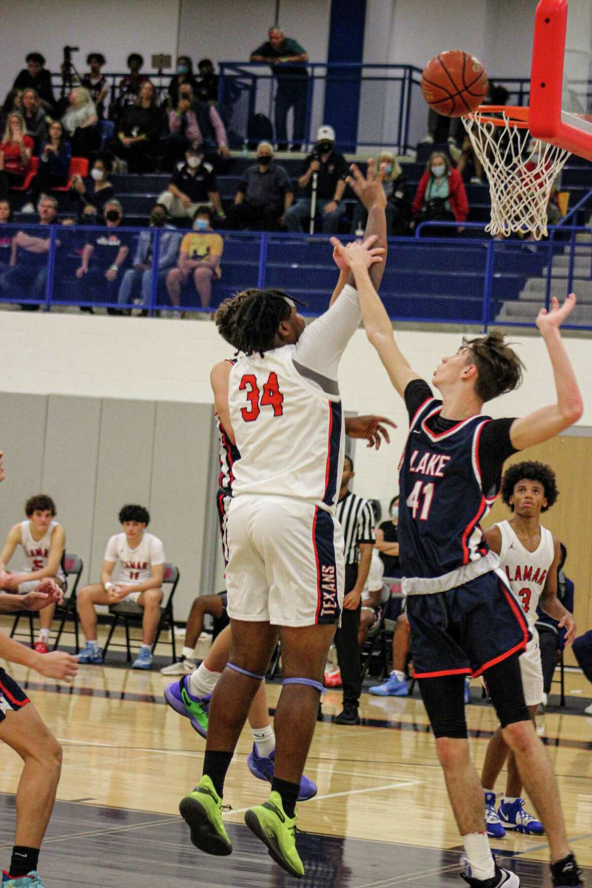 Lamar senior Orion Irving puts in a layup during the Texans' Nov. 16 game against Clear Lake.