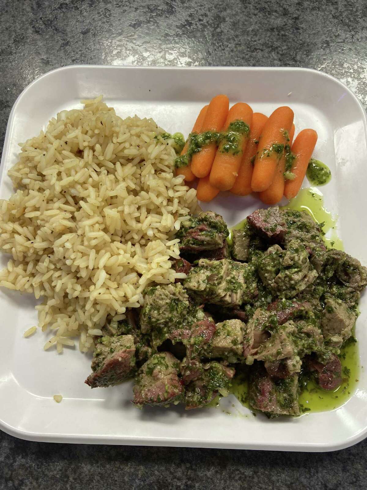 Former NFL player Jared Veldheer's chimichurri steak lunch he serves to the students. CREDIT: Photo courtesy of Katie Tietema