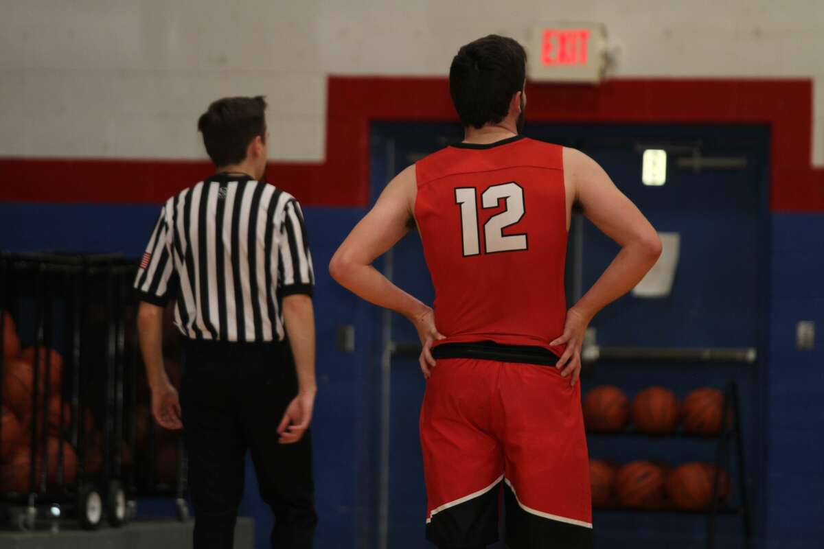 Bear Lake's Jake Griffis watches his teammate shoot free throws in a triple overtime victory against Catholic Central. 