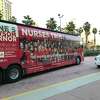 The California Nurses Association, which endorsed Gavin Newsom in his 2018 gubernatorial campaign, campaigned around California with his photo on the side of this bus, shown here in San Diego during the California Democratic Party convention in 2018.