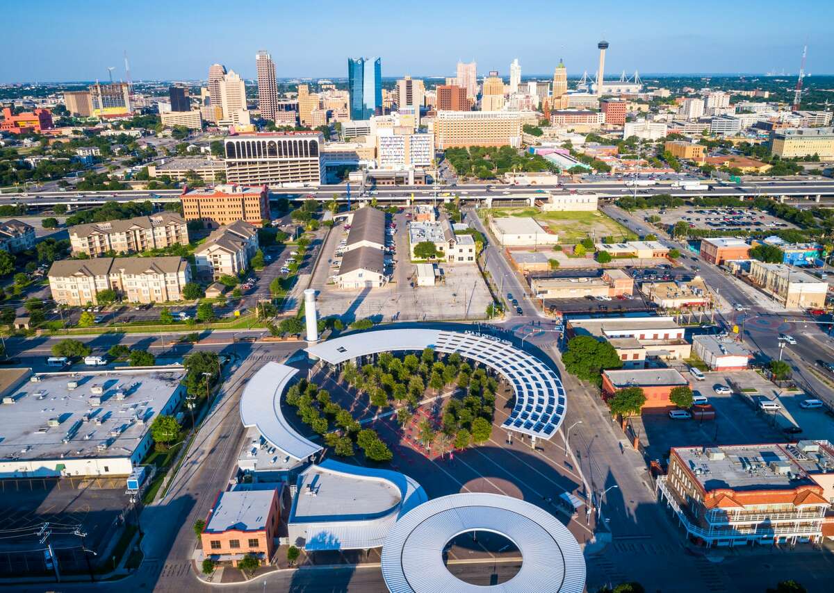 Aerial drone view above curved futuristic buildings - Modern Architecture of Solar Panel Renewable Rooftop of Futuristic San Antonio Texas