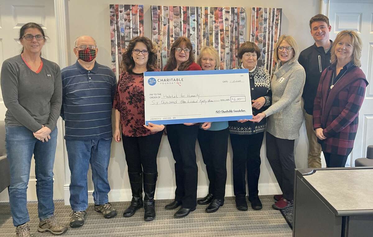 Real Estate One's Beulah Office participated in Real Estate One's national soup fundraiser, and raised $6,383 for Habitat of Humanity of Benzie County. Pictured left to right; Terry Lalas, Bill Frostic, Kathy Neveu, Doreen Carter, Sharon McKinley, Suzy Voltz, Hayden Bretzke and Denise Clasen.