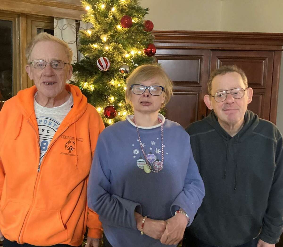 The 501(c)3 organization, Ability Beyond, has received a $9,000 charitable contribution from the Ellen Knowles Harcourt Foundation private non-profit organization. Marty, Tommy, and Kathryn, of Ability Beyond, recently celebrate the Christmas holiday, at the Ability Beyond home in New Milford.