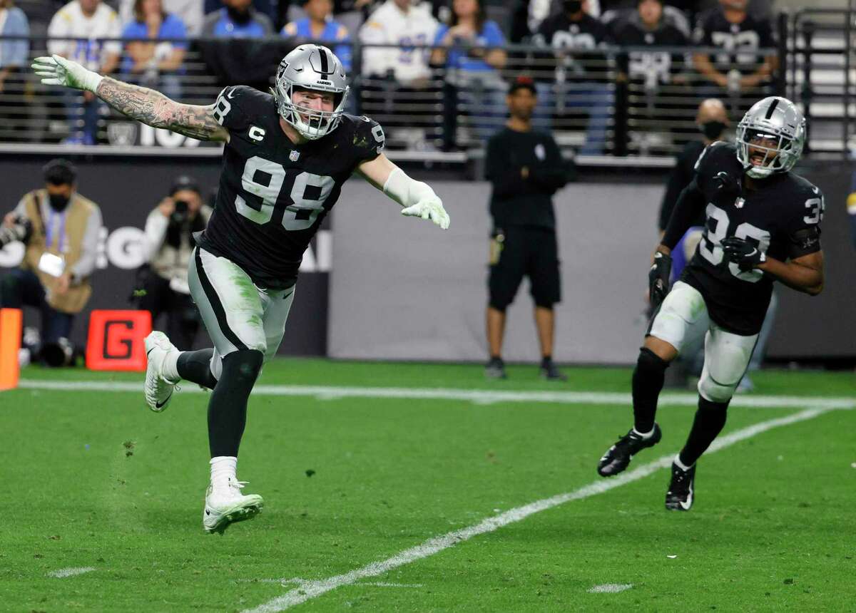 Defensive end Maxx Crosby (98), cornerback Nate Hobbs (39) and their Raiders teammates will open the NFL playoffs with a game at Cincinnati at 1:30 p.m. Saturday. ( Channel: 11Channel: 3Channel: 8)