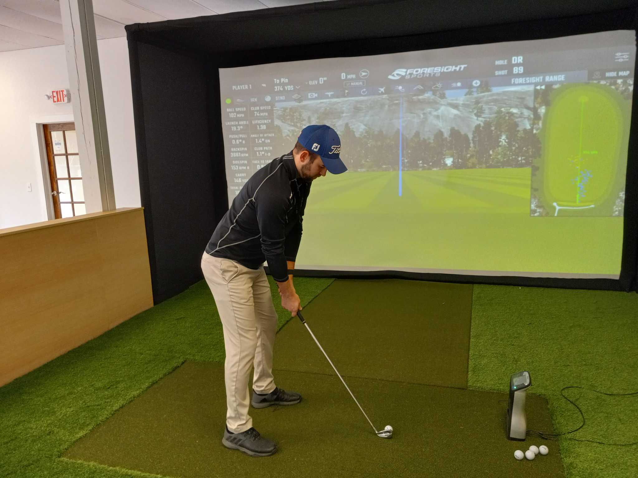Winsted business owner opens virtual golf training center