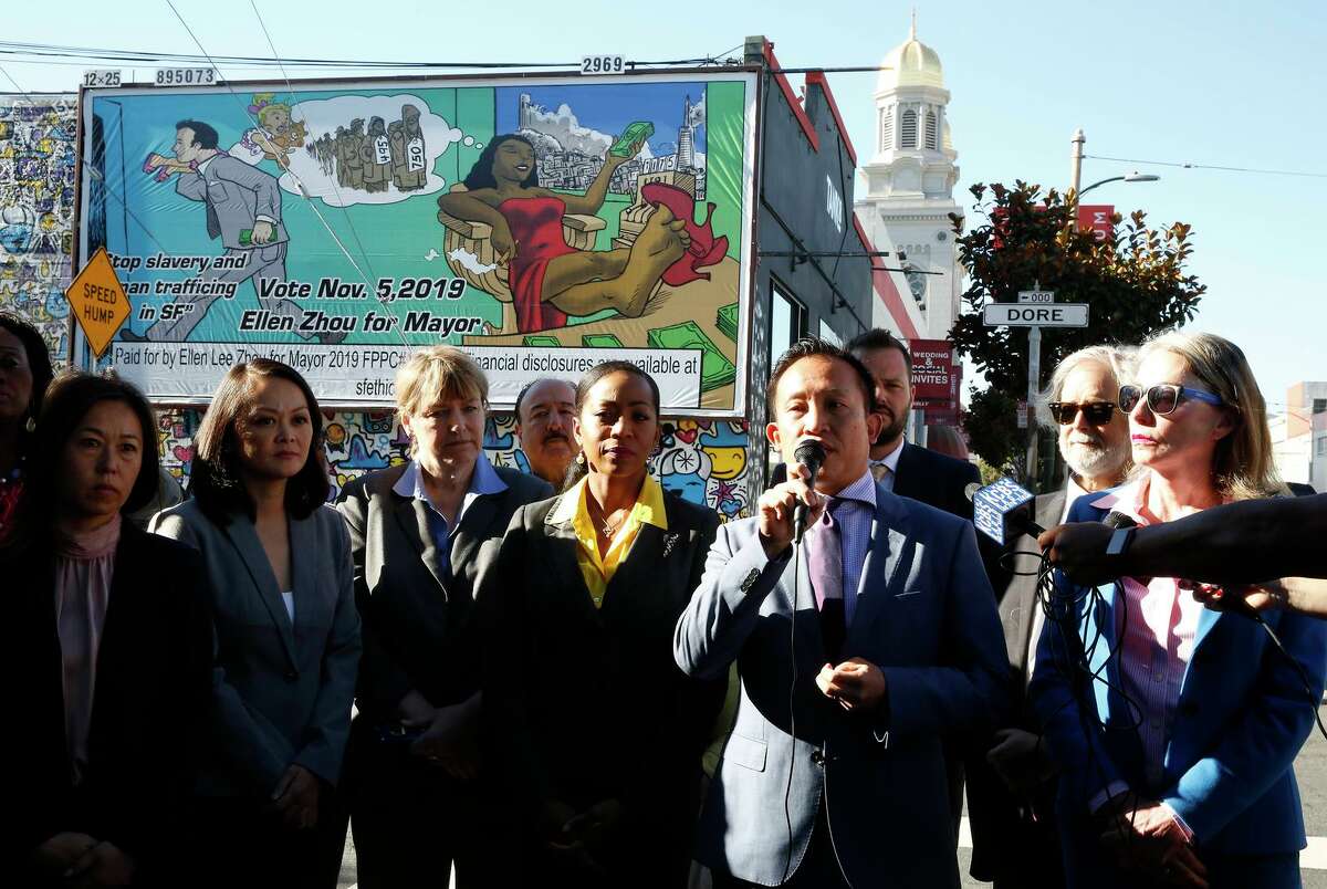 David Chiu (front row second from right) stands with other San Francisco officials on Oct. 21, 2019, as he speaks during a press conference in which San Francisco leaders protested an Ellen Zhou for Mayor billboard that they said was racist.